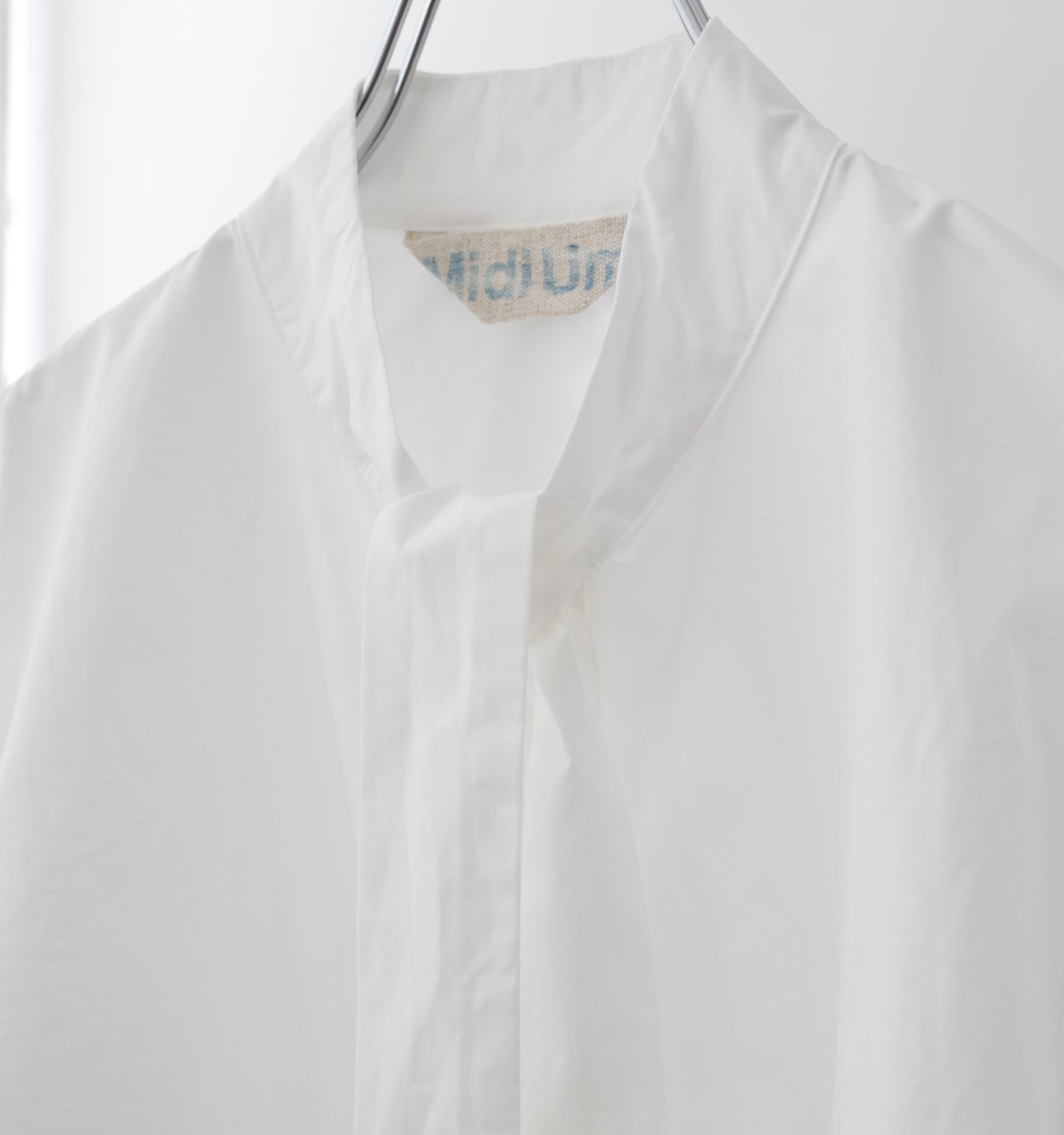tie-neck shirt