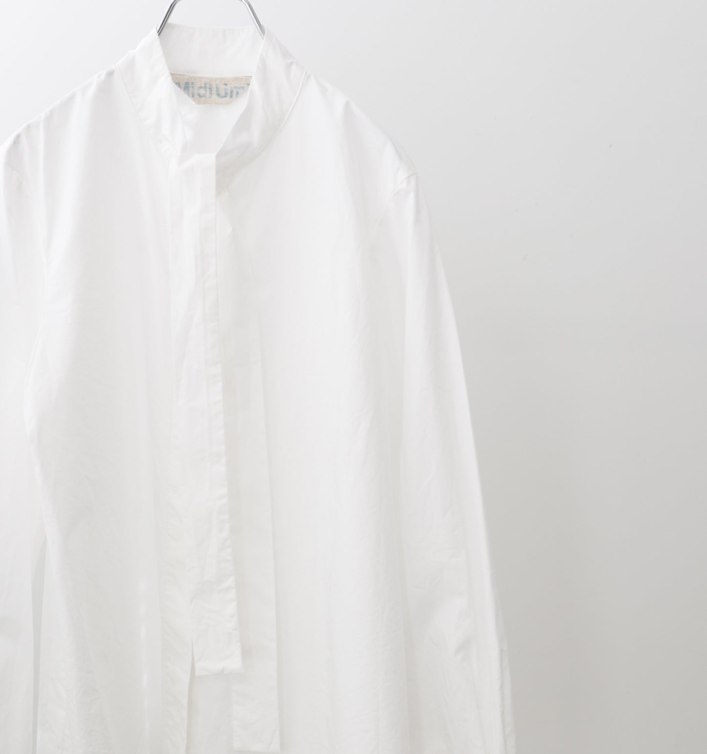 tie-neck shirt