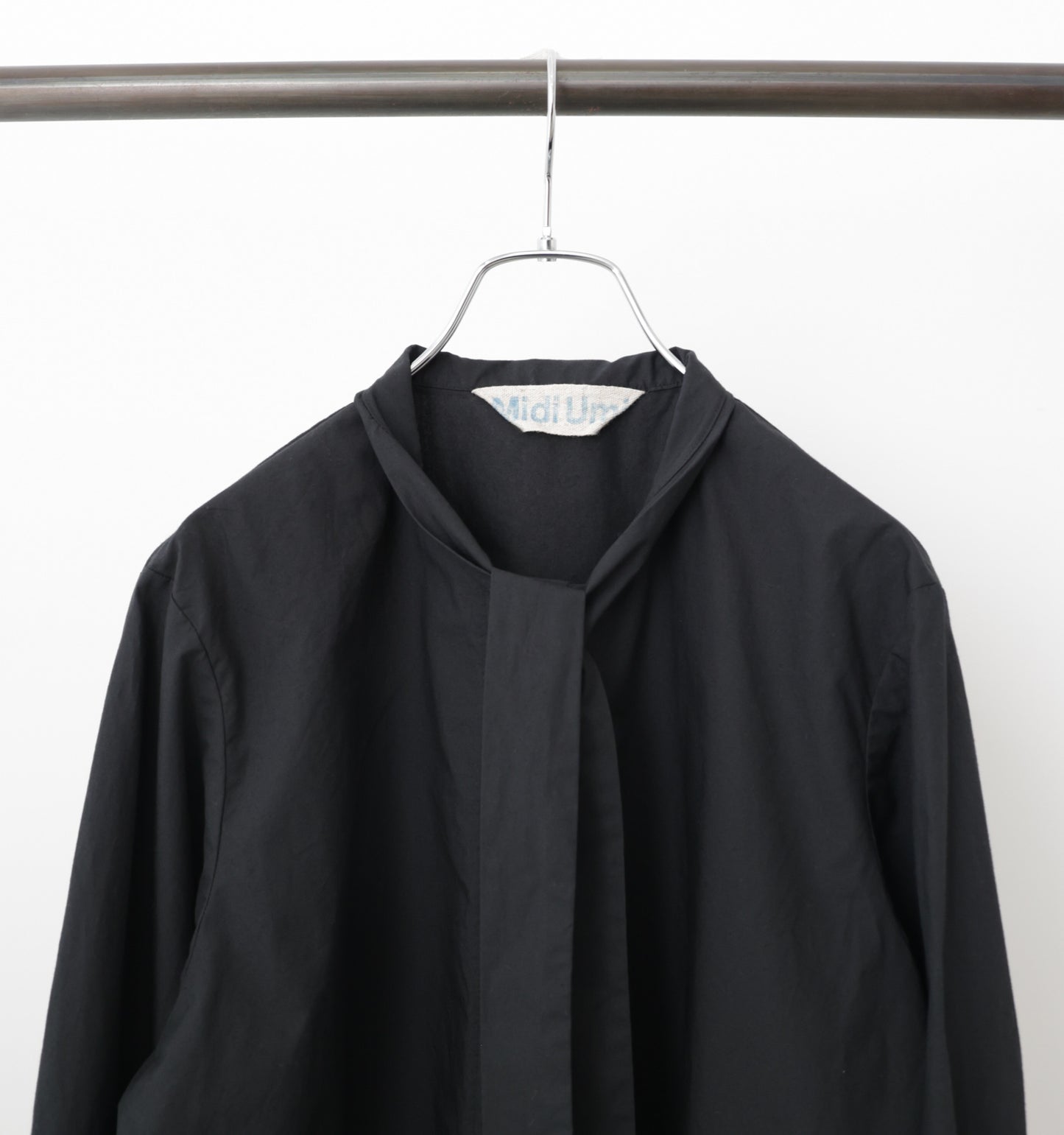 tie-neck shirt