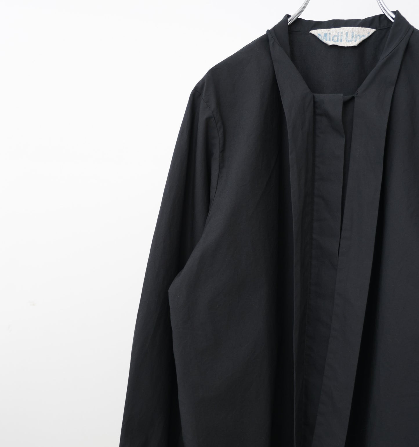 tie-neck shirt