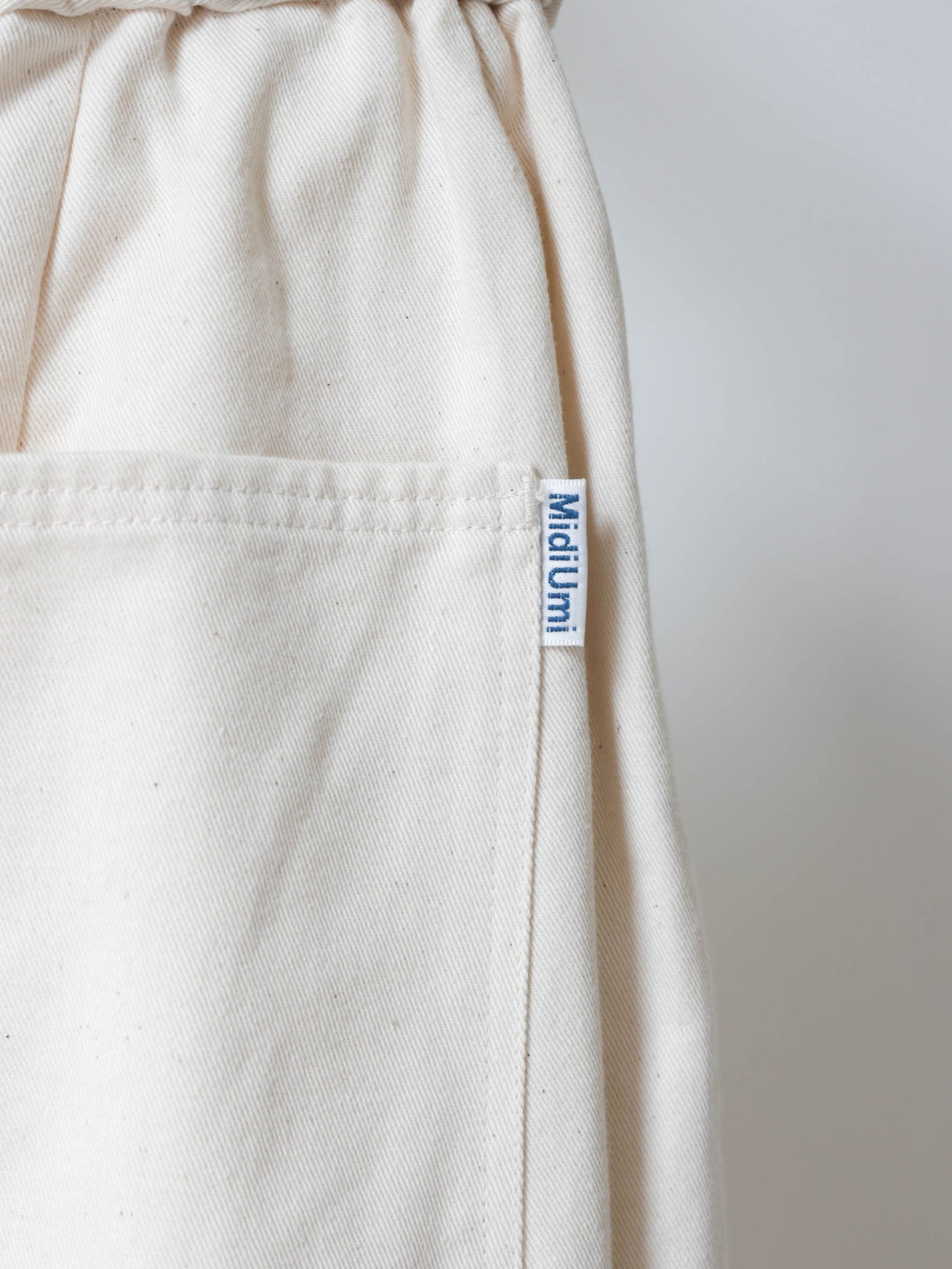 light wide tuck denim